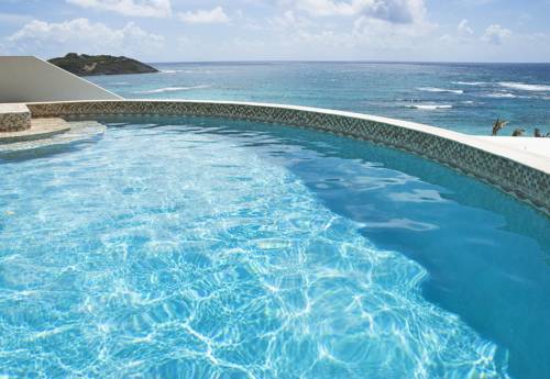 Plage de l'aube Sint Maarten Caribbean Código Promocional Booking.com
